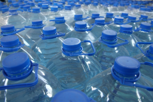 Pre-packed bottled water in plastic bottles